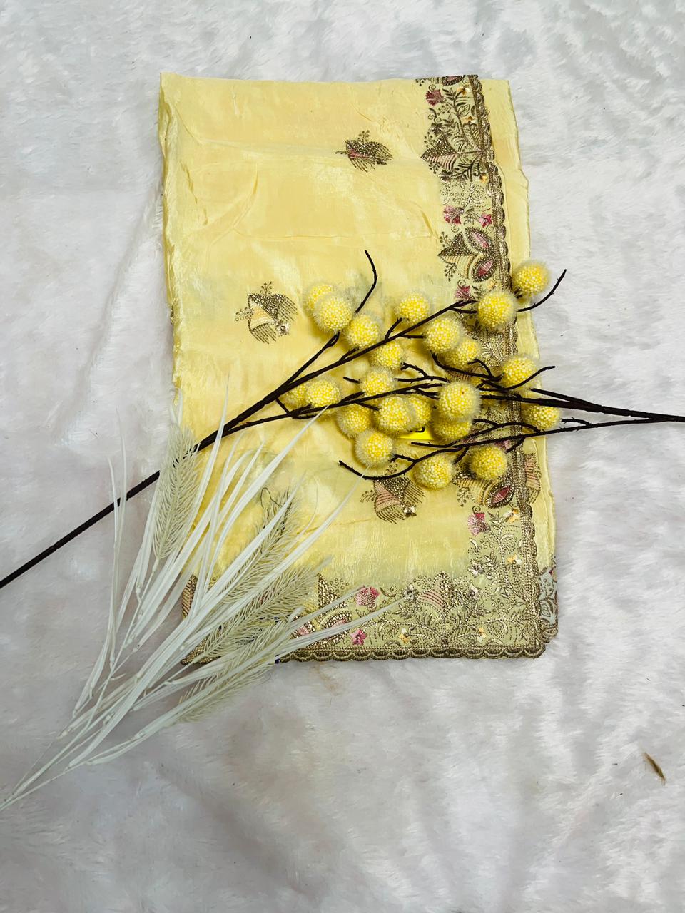 Yellow Heavy Embroidered Soft Silk Saree