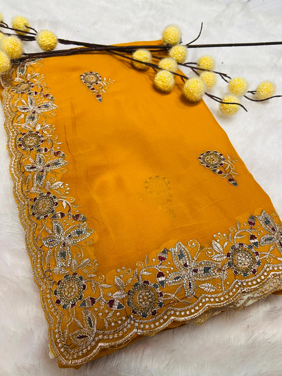 Yellow Heavy Embroidered Border Saree
