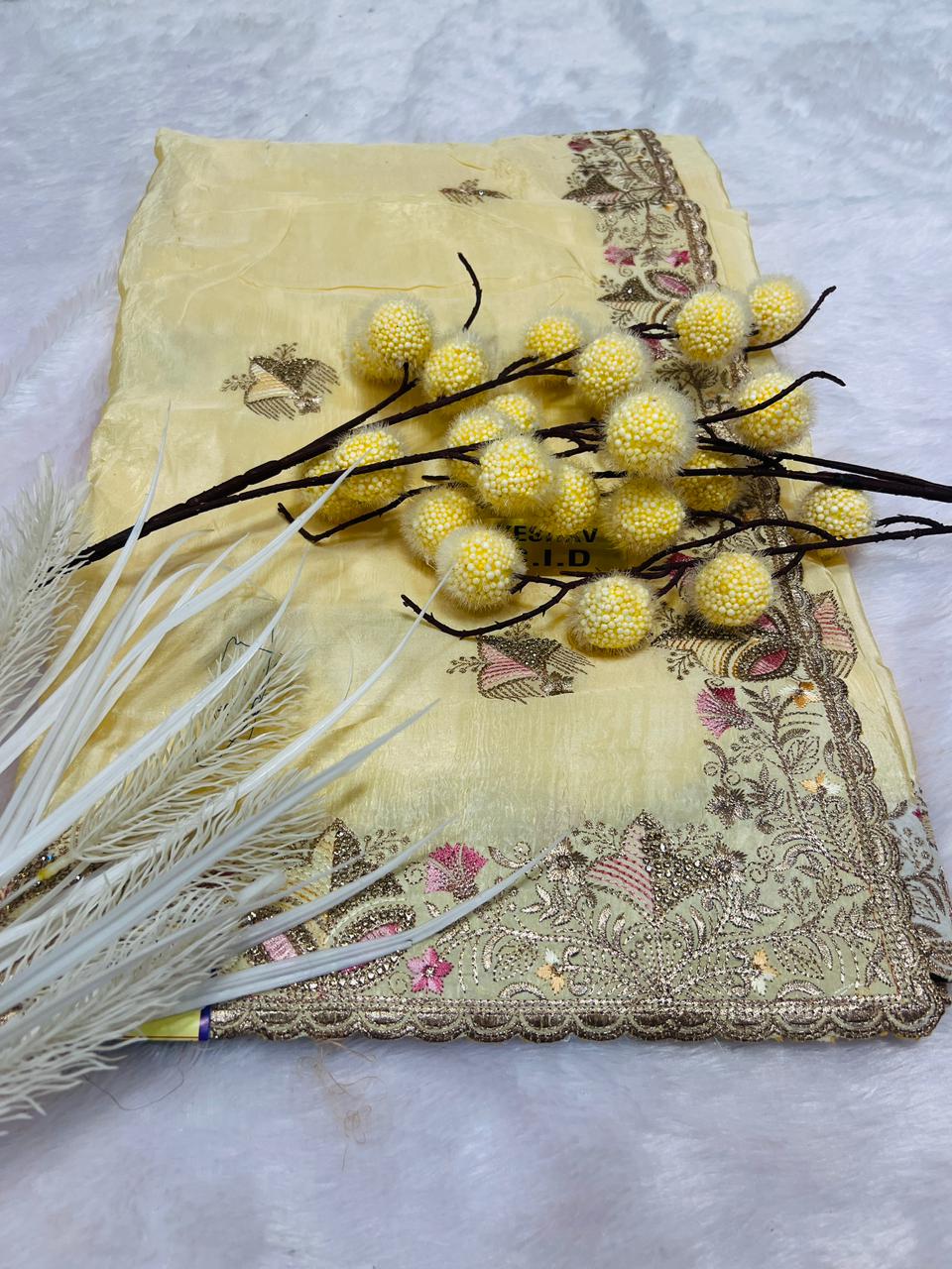Yellow Heavy Embroidered Soft Silk Saree